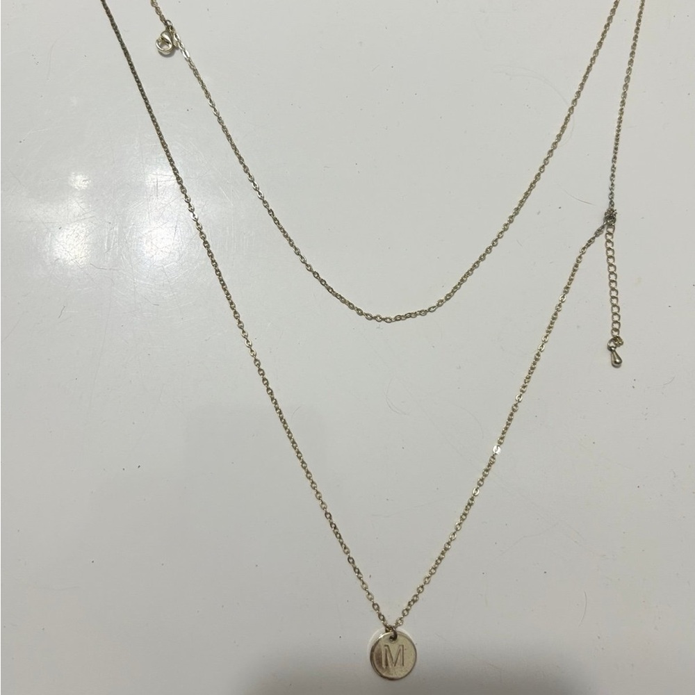 M initial layered necklace
only issue is that there is a knot i couldn’t get out